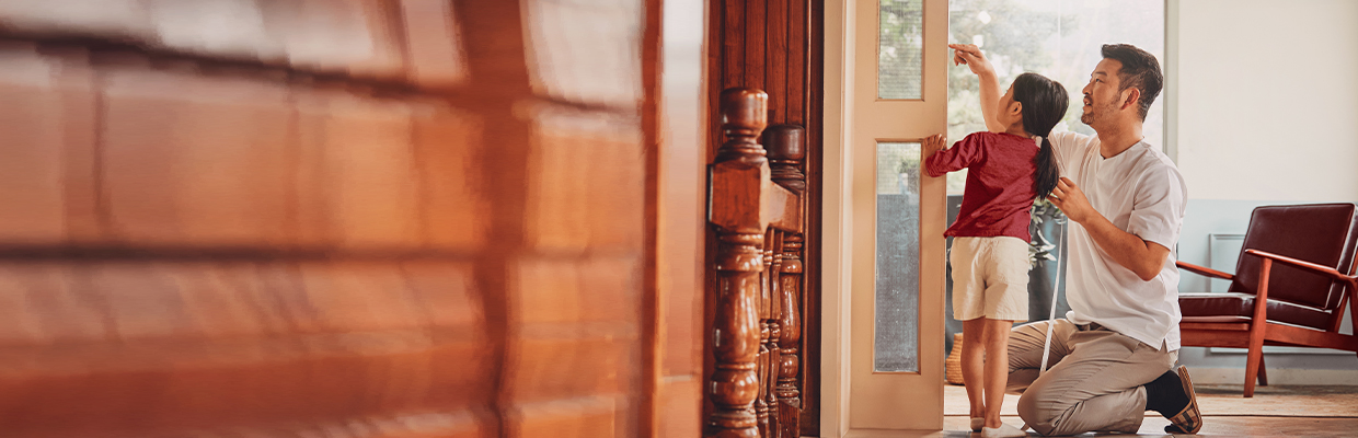 A little baby sleeping in his mother's arms; image used for HSBC Malaysia Amanah Junior TopRate Savings page.