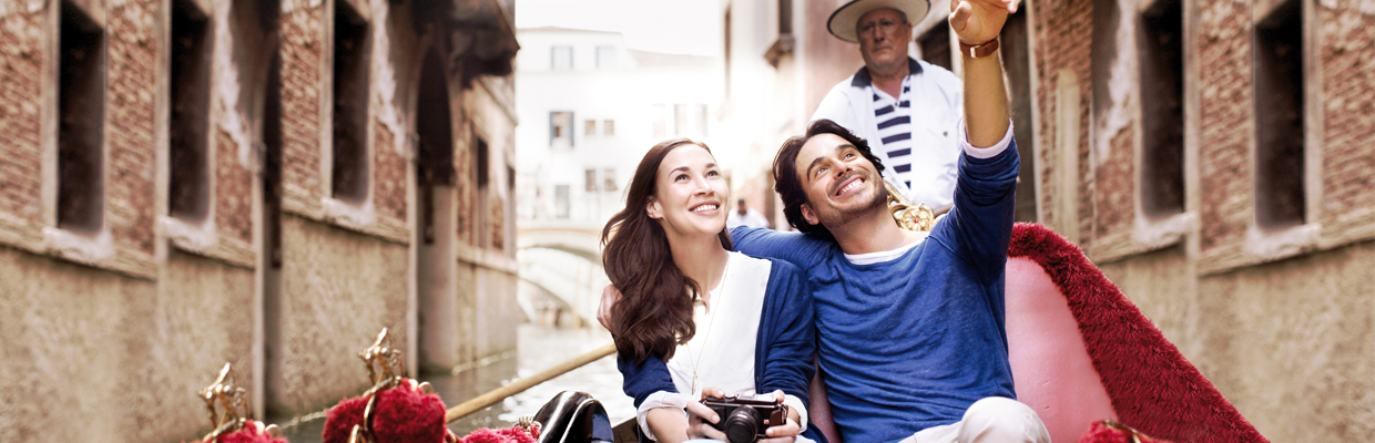 A man and a woman are in a boat; image used for HSBC Malaysia Amanah Cash Advance