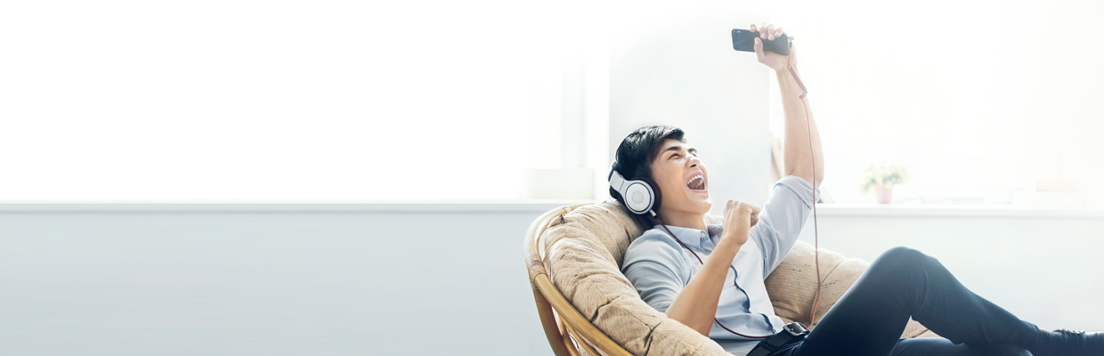 Young man listening to music; image used for HSBC Perks@Work